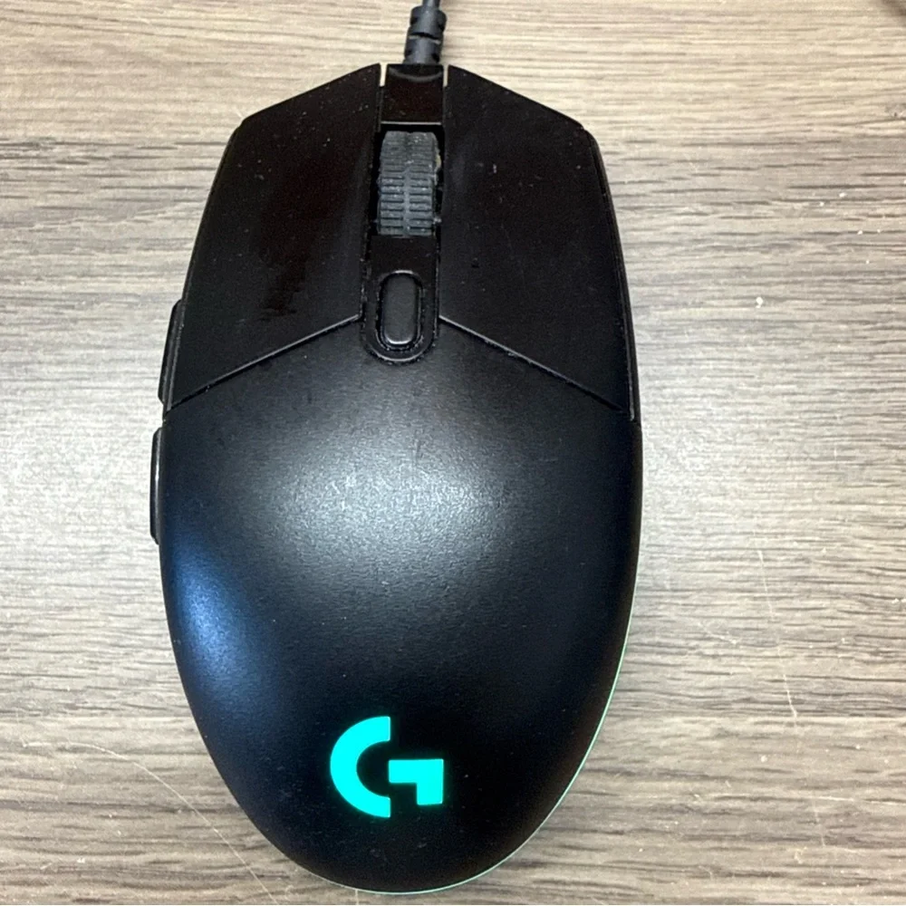 Logitech Black Wired Gaming Mouse with Pink RGB Accent